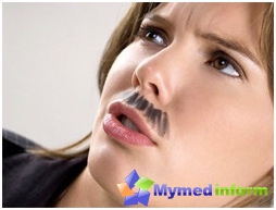 Simptomų hiperandrode yra moters ūsų ir barzdų išvaizda
